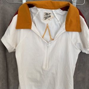 Camp Collection collared bodysuit with zipper and star on the back detail